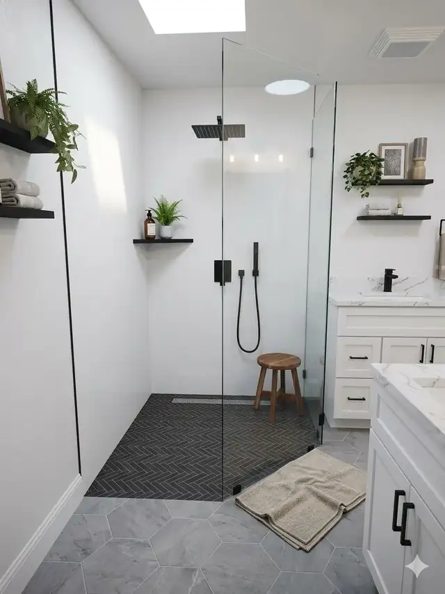 Curbless walk-in shower in Murrieta with frameless glass, matte black fixtures and a skylight