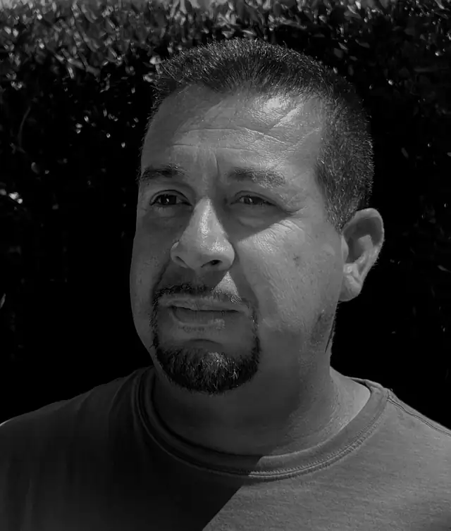 Black and white portrait of Joel Cervantes, owner of JC Custom Cabinets in Temecula